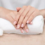 Long nails with natural shine. tips on how to make your nails grow faster.
