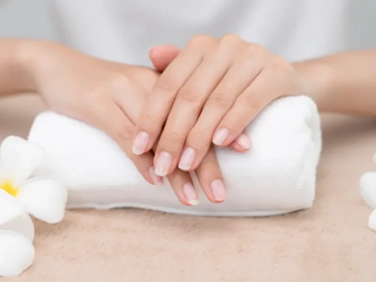 Long nails with natural shine. tips on how to make your nails grow faster.